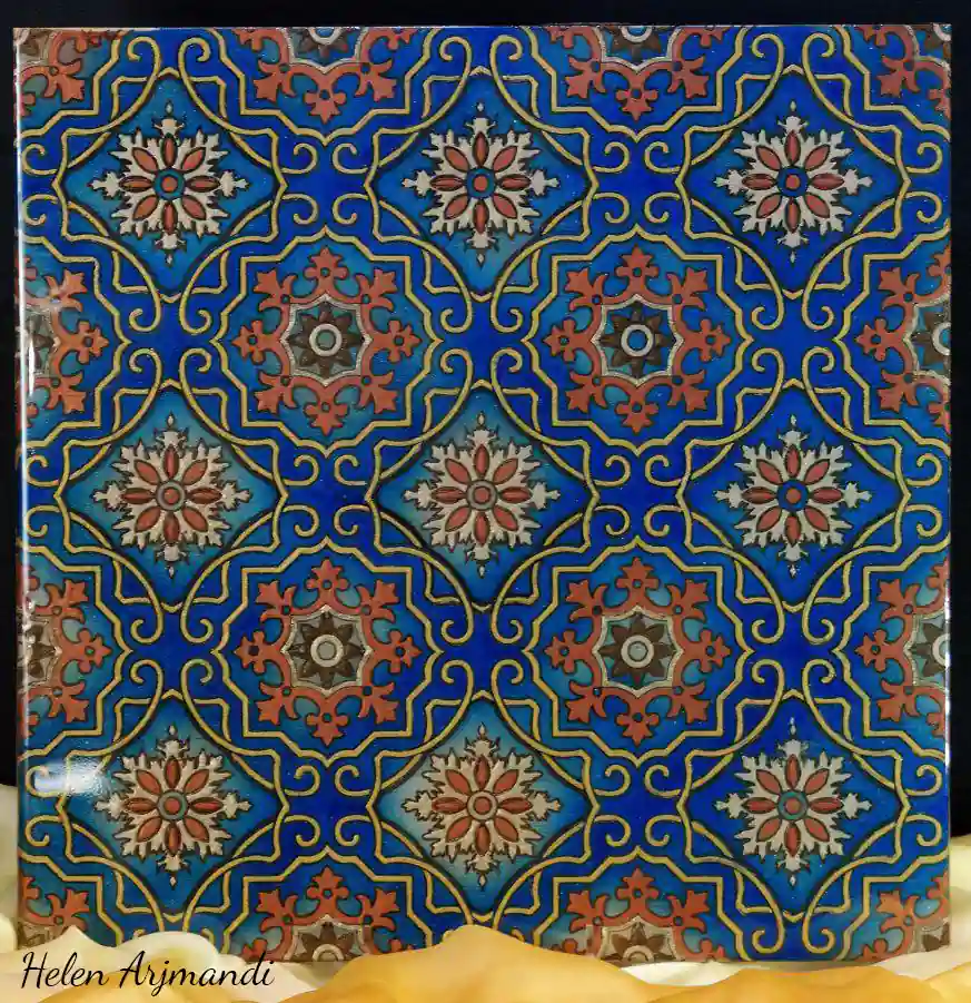 Square panel of blue and gold Persian geometric tilework.